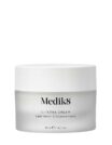 A white jar of Medik8 cream with minimalist labeling.