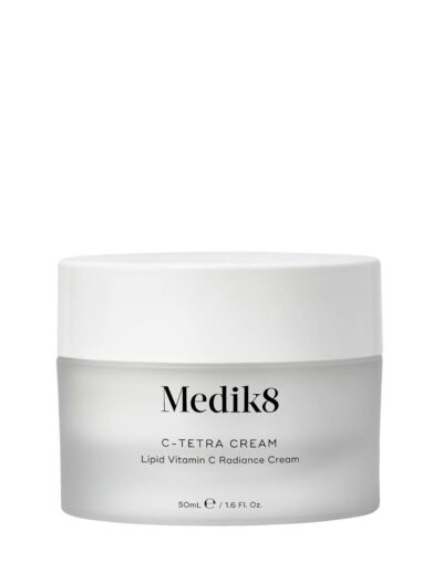 A white jar of Medik8 cream with minimalist labeling.