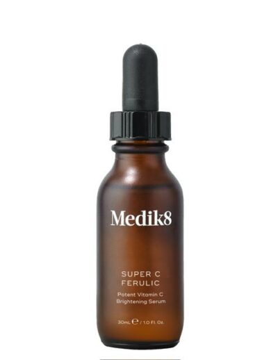 Brown dropper bottle labeled Medliks for skincare.