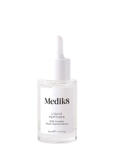 Clear dropper bottle of Medik8 skincare serum on white background.