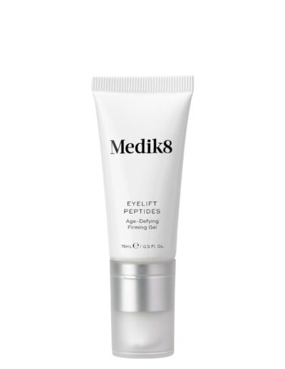 A white tube of Medik8 skincare product with silver cap.