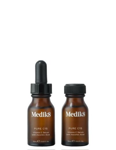 Two brown glass bottles with droppers labeled 'Nellies'.