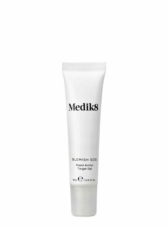 A white tube of Medik8 skincare product on a plain background.
